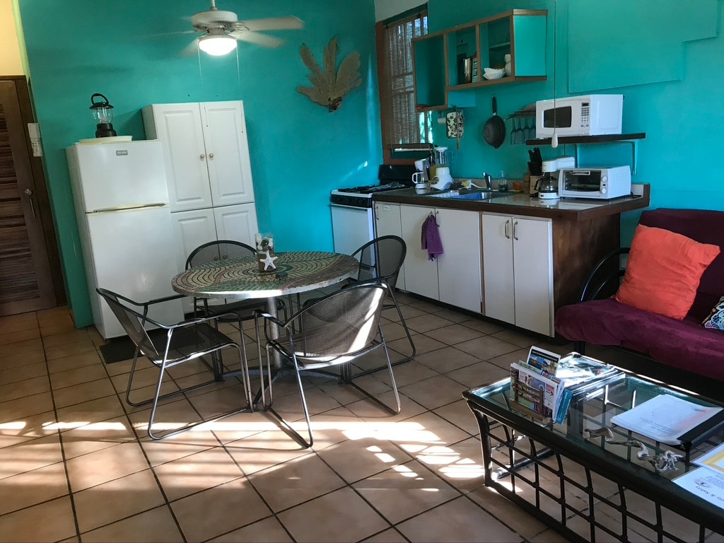 Gaviota kitchen with ceiling fan and full kitchen view