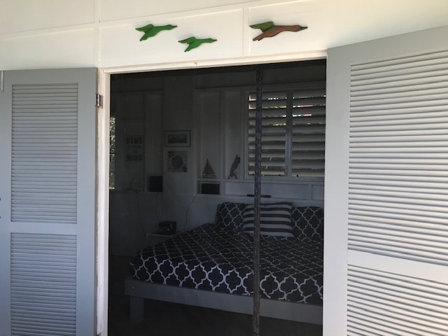 La Paloma bedroom entrance with louvered doors